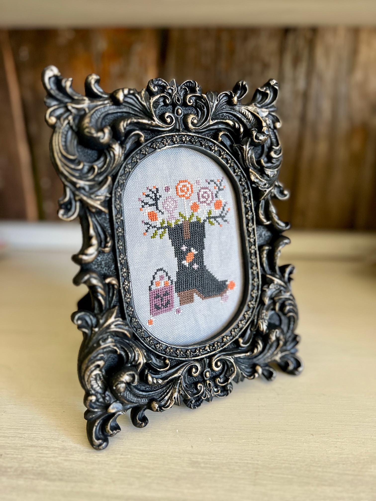 Trick or Treat Cowboy Boot Bouquet designed by Cross Stitch Kim | Framed Cross Stitch Finish